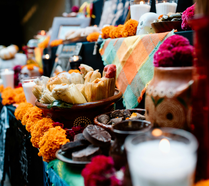 Colorful candles, breads, and flowers