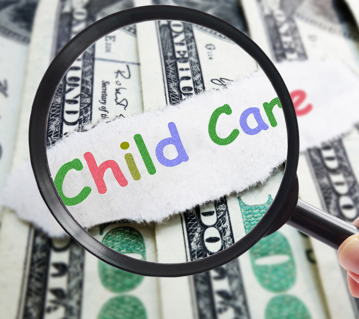 Word "child care" under a magnifying glass surrounded by 100 dollar bills.